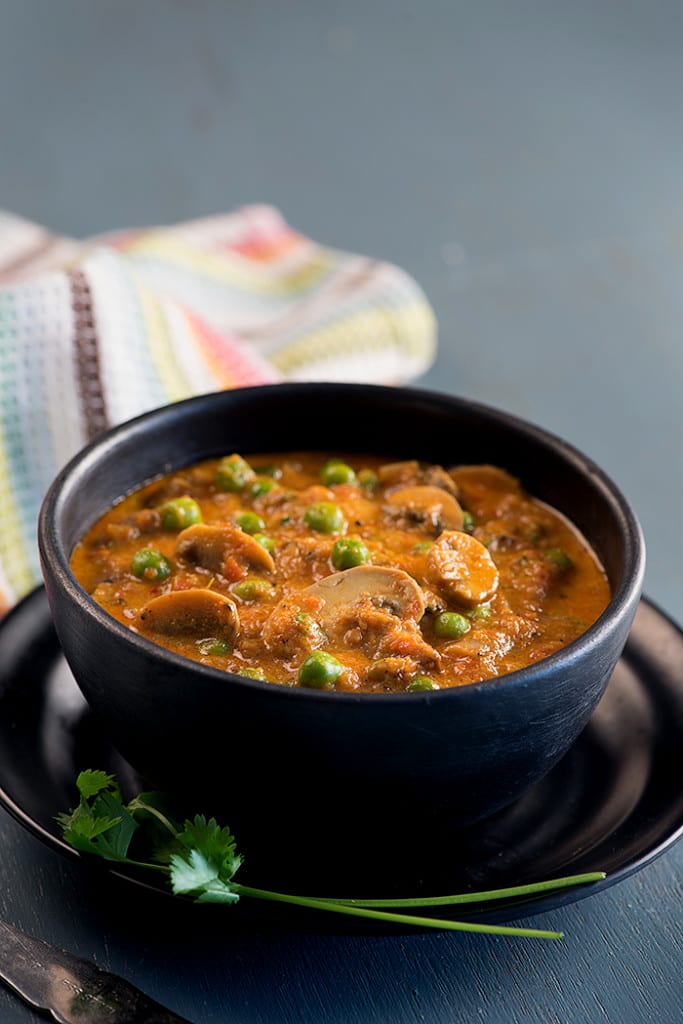 Matar mushroom curry or matar mushroom ki sabzi is very popular Indian curry made with peas and mushrooms.