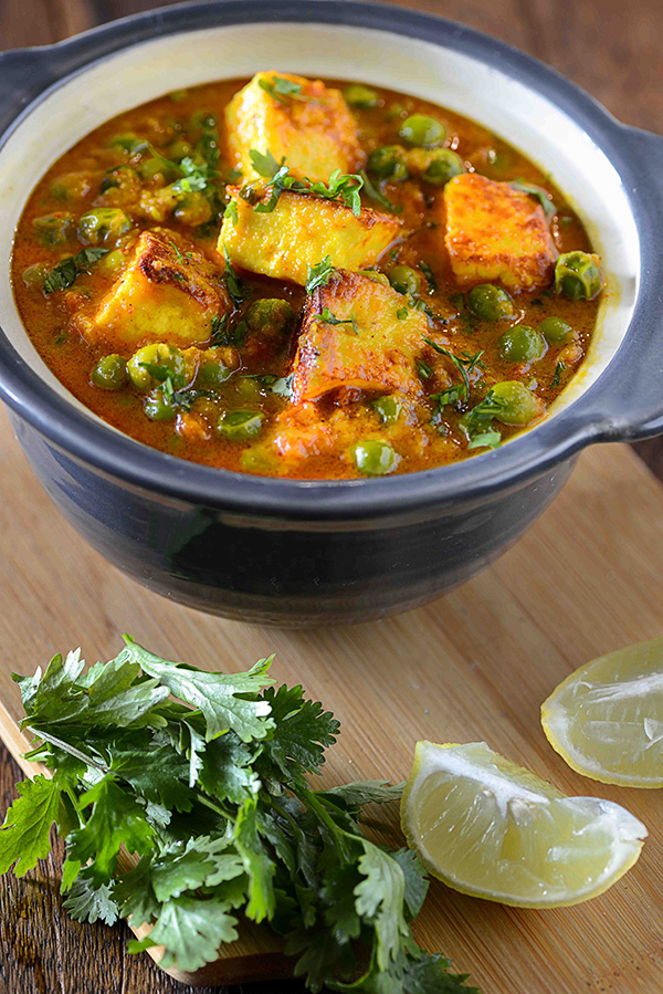 Matar paneer or mutter paneer curry is hearty vegetarian curry from North Indian cuisine. This is one of most popular paneer curry recipe.