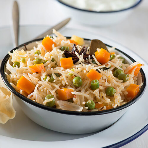 Vegetable Pulao (Veg Pulav) is a One pot dish that makes a complete healthy Indian meal by itself. Made with cooking rice with assortments of vegetables and spices, the Vegetable Pulao is one of the most convenient meal when you want to eat something healthy tasty and homemade.