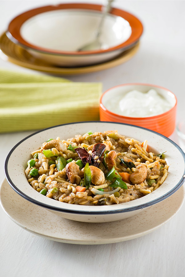 Bisi Bele Bath or Bisi Bele Hulianna is a dish from Karnataka and is part of Udupi cuisine. This name Bisi Bele Bath means "hot lentil rice" in Kanadda language .The main ingredients are rice, toor dal and vegetables along with some aromatic spices.