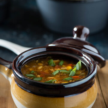 Hot and sour egg drop soup is egg drop soup with spicy and bold Indo Chinese flavors. Warming and comforting this winter soup is very easy to make and comes together in 20 Minutes.