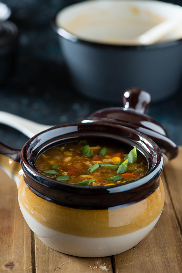 Hot and sour egg drop soup is egg drop soup with spicy and bold Indo Chinese flavors. Warming and comforting this winter soup is very easy to make and comes together in 20 Minutes.