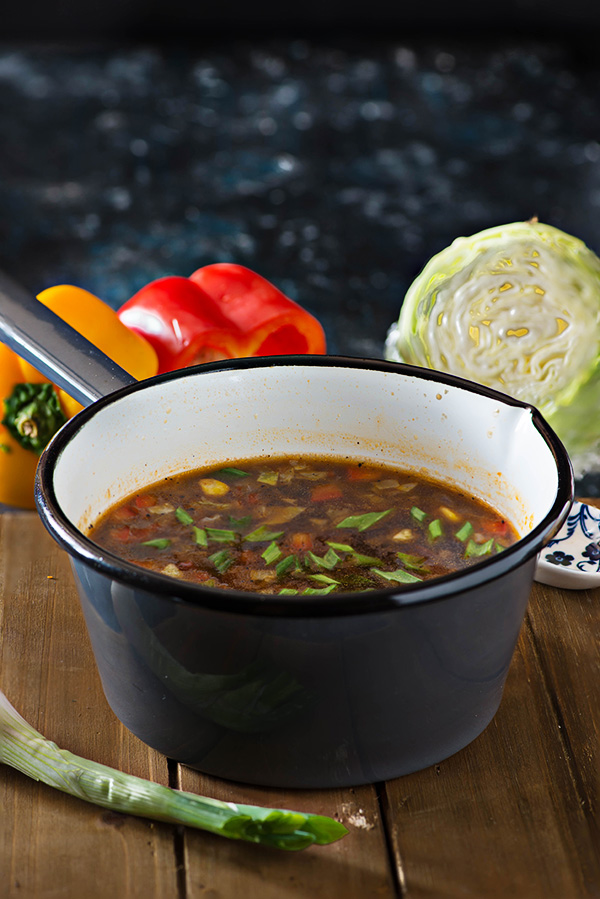 Hot and sour egg drop soup is egg drop soup with spicy and bold Indo Chinese flavors. Warming and comforting this winter soup is very easy to make and comes together in 20 Minutes.