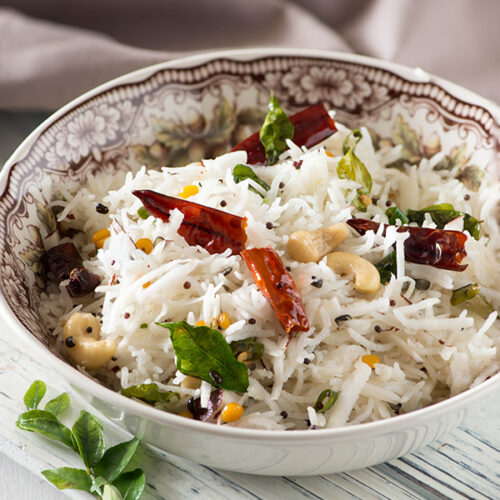 coconut rice recipe is fragrant, aromatic and one of my favourite side dish ! These days I make it in instant pot , electric pressure cooker any other pressure cooker. All It takes is 20Minutes. Cooked with fresh tender coconut and lots of aromatic, this is the perfect side dish for any Indian curry.