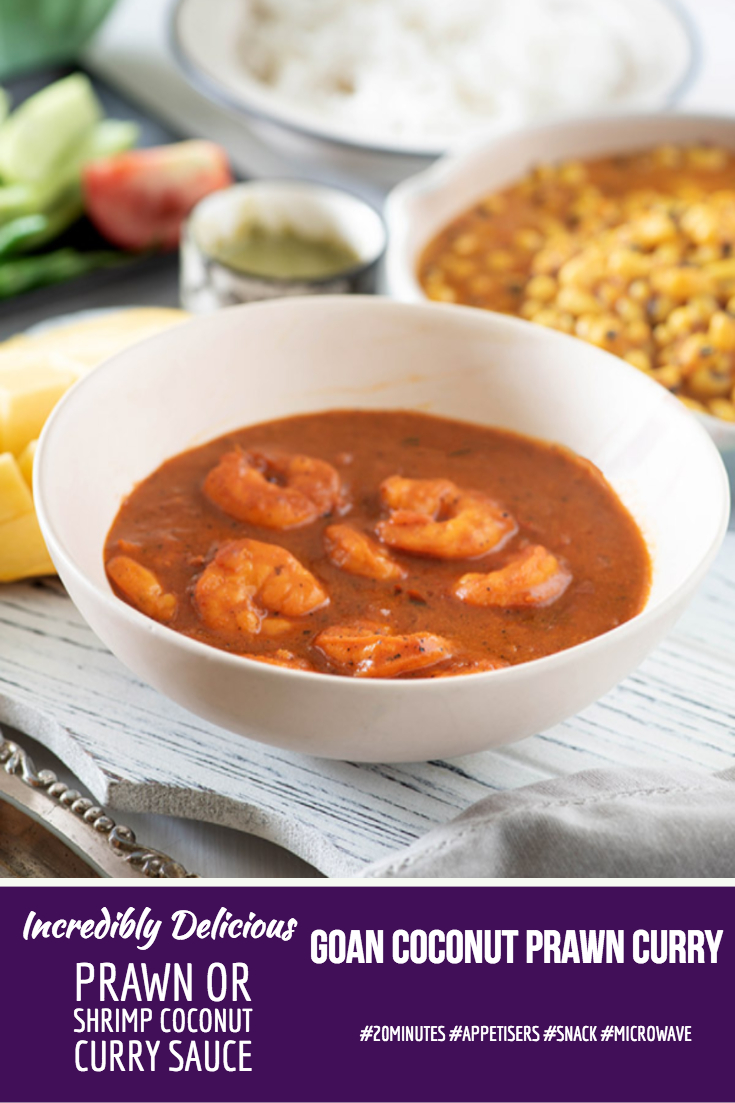 Goan prawn curry - a creamy, juicy, spicy, rich Goan curry with delicious coconut flavour. The prawn curry recipe perfect for a dinner party as well as a comforting weeknight dinner. Serve it with steamed rice or Goan pan for a delicious meal, specially you love prawn recipes #glutenfree #LowGi #Curry #prawnrecipe by @rekhakakkar