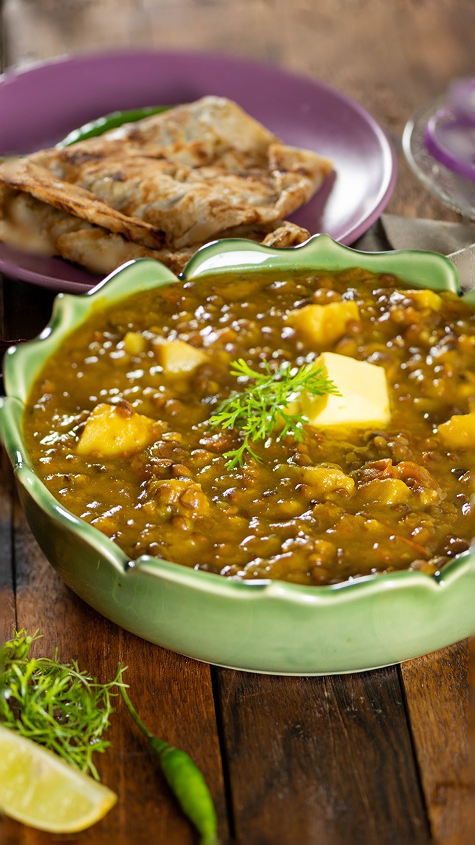 brown lentil curry with butter and naan