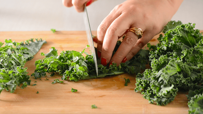cut kale into thin strip to prepare kale