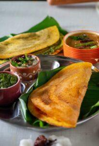 Crisp moong dal dosa with coconut chutney and sambar