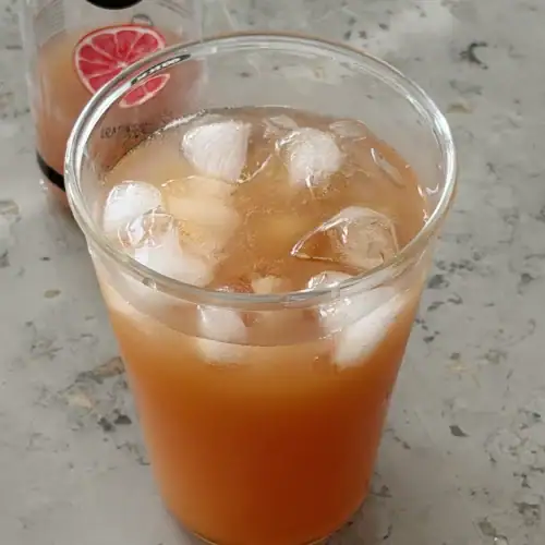 Dr. Oz weight loss drink with grapefruit juice, apple cider vinegar and honey in a glass